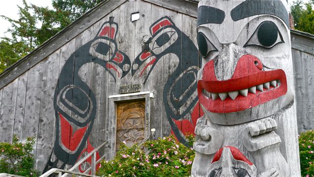 Totem and storefront in Old Masset
