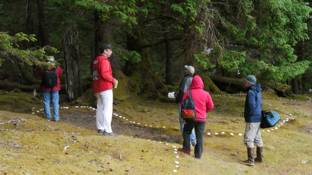 Frank tours village site