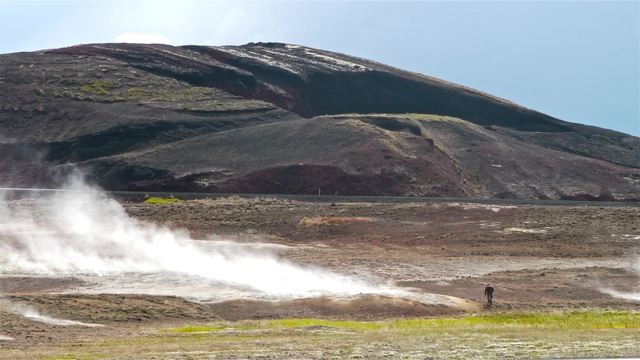 Steam issuing from ground