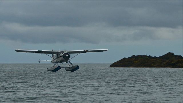 George's plane lands at Hotsprings Island