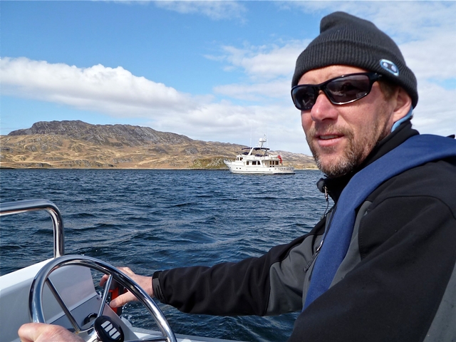 Chris Conklin (captain) in tender in West Loch Tarbert