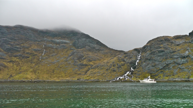 Venture at anchor with waterfall Loch Scavaig distant view