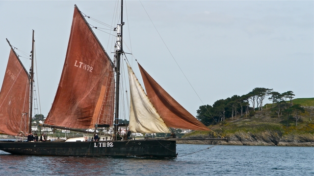 Traditional vessel at Falmouth Lighthouse