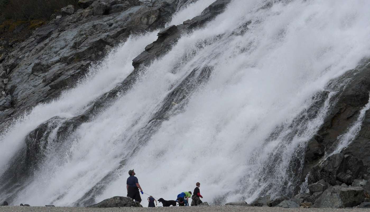 Waterfall adjacent to glacier