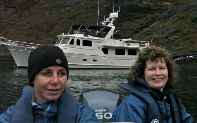 Patty and Christine in tender with Venture behind
