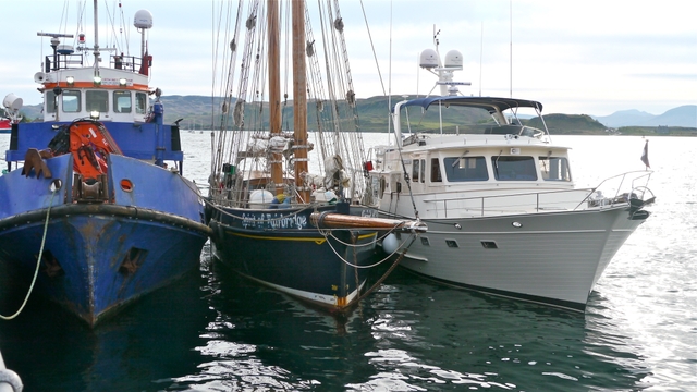 Venture rafted up in Oban