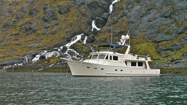 Venture at anchor with waterfall Loch Scavaig